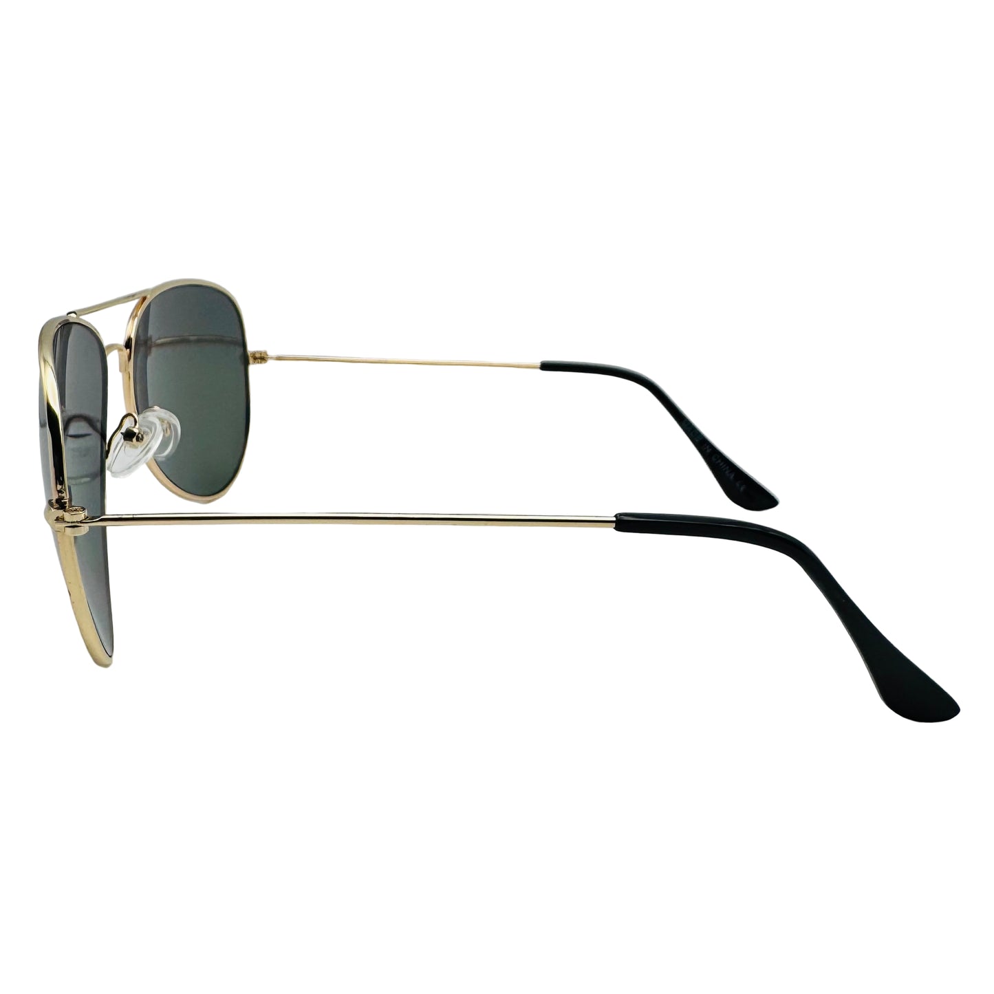 Sunglasses with gold frame and black arms on a light gray background