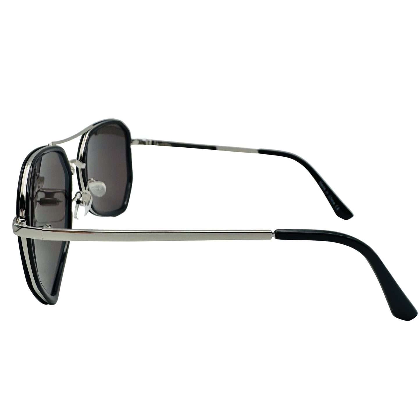 Sunglasses with black lenses and black and silver frames on a light gray background