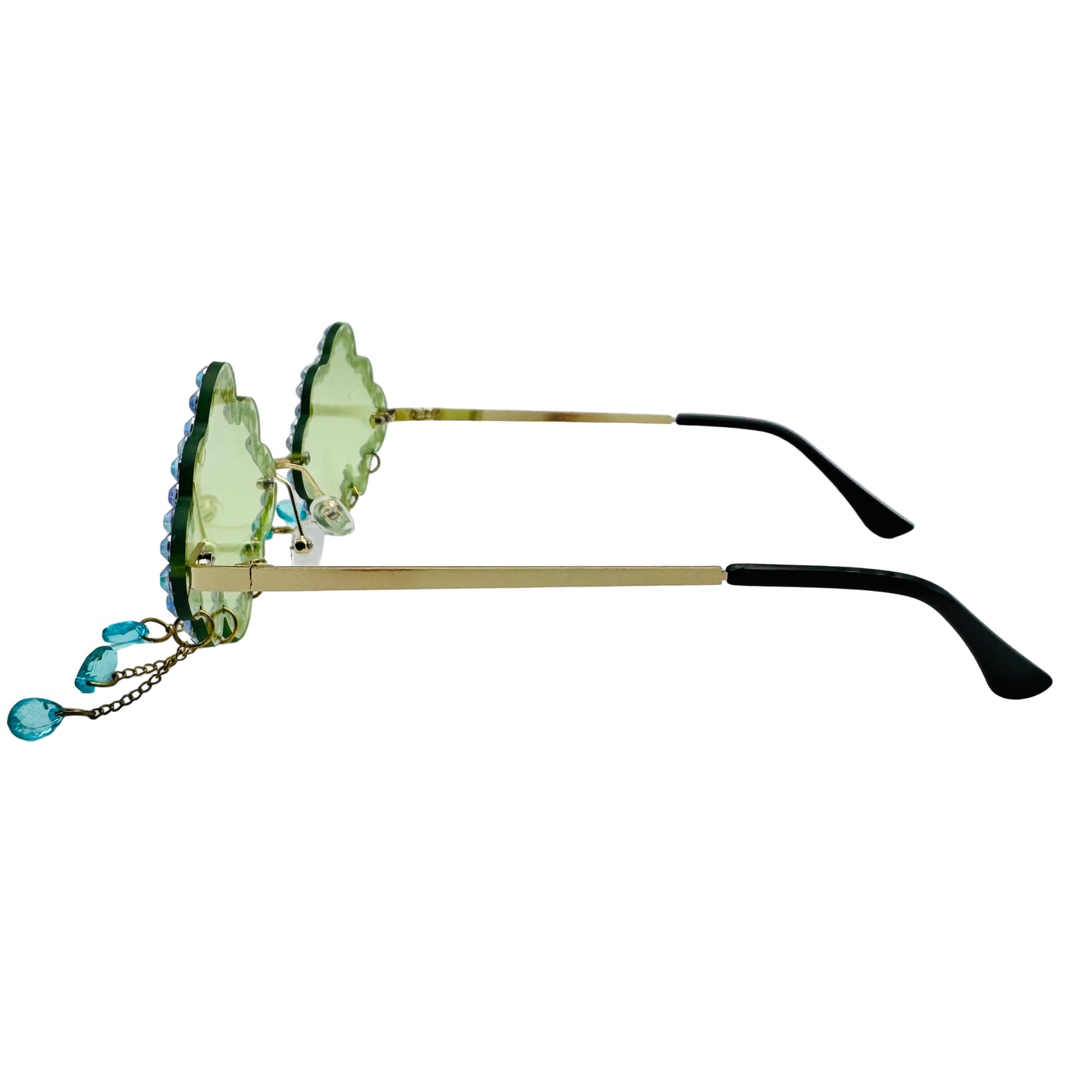 Sunglasses with green lenses and gold frames on a white background