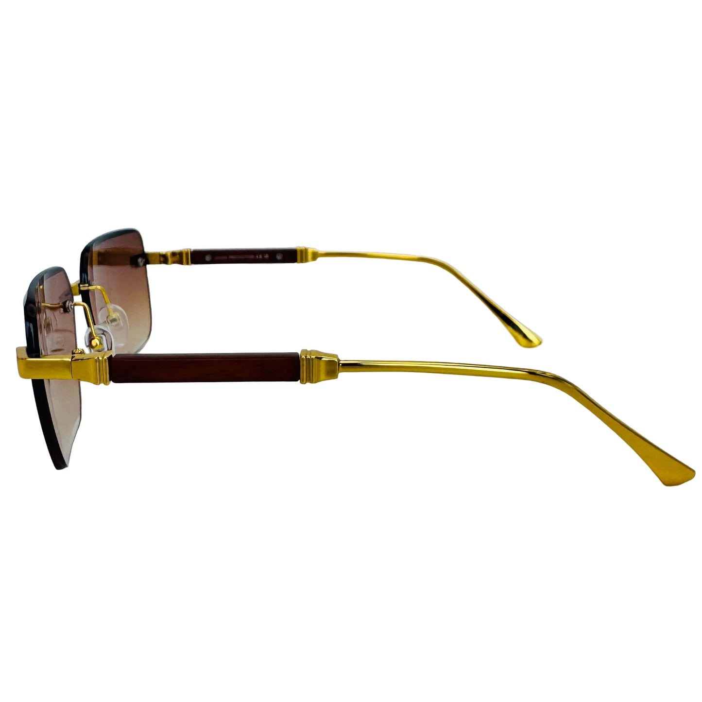 Sunglasses with gold and brown frame on a light gray background