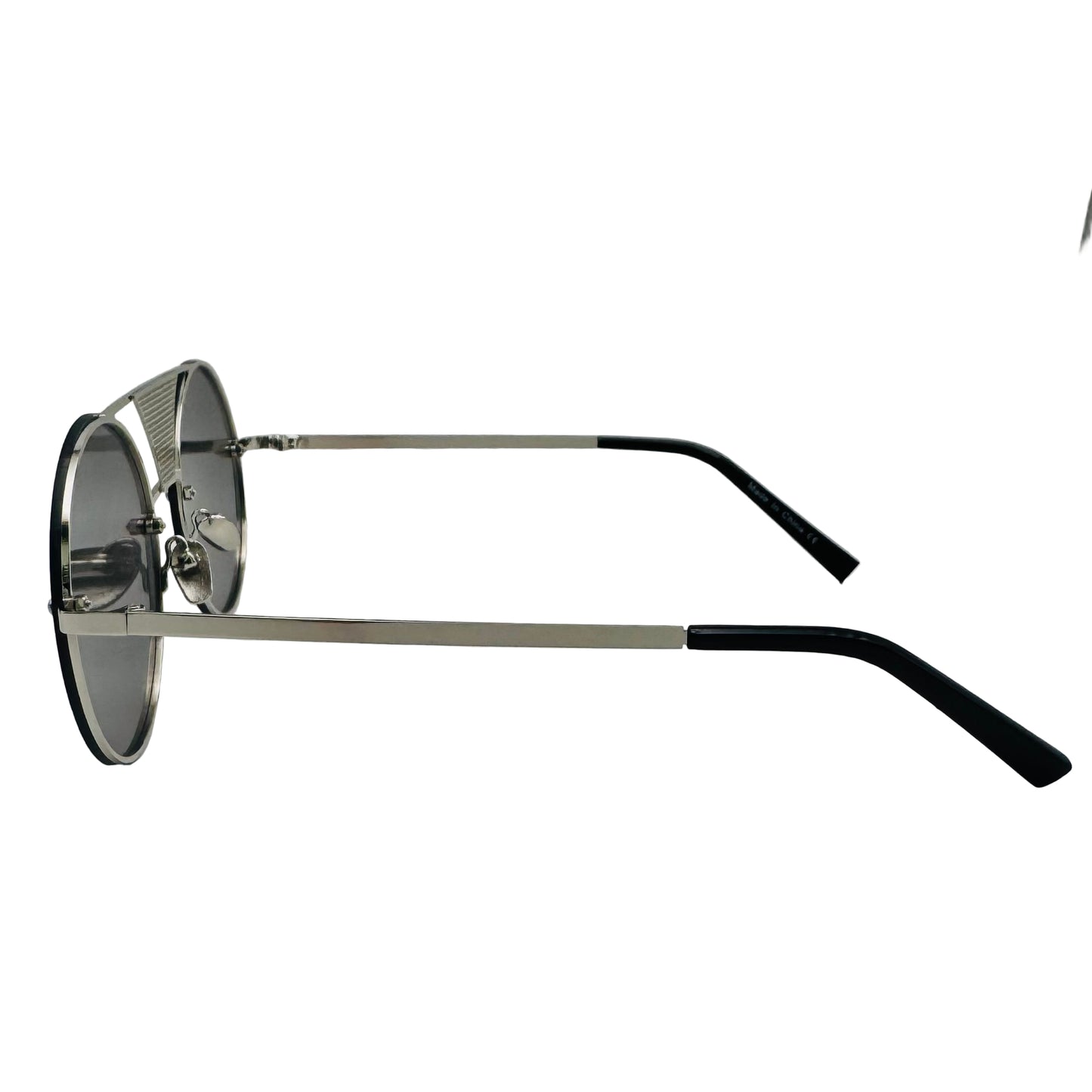 Sunglasses with black and silver frame on a light gray background
