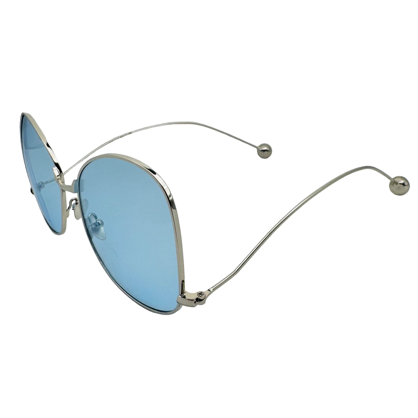 Sunglasses with blue lenses and silver frames on a white background