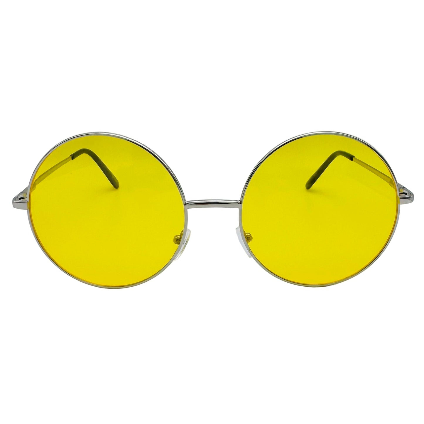 Round yellow sunglasses with silver frames on a light gray background