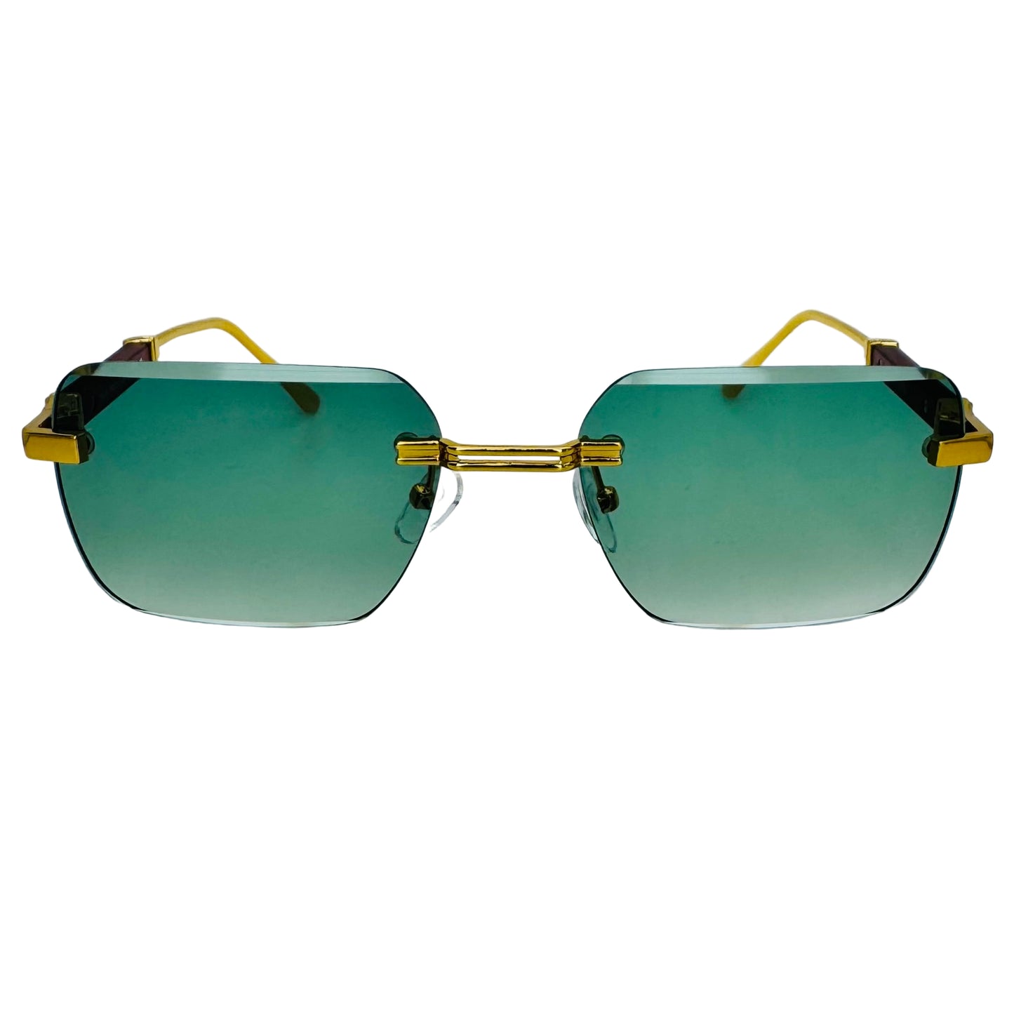 Sunglasses with gold frames and green gradient lenses on a light gray background