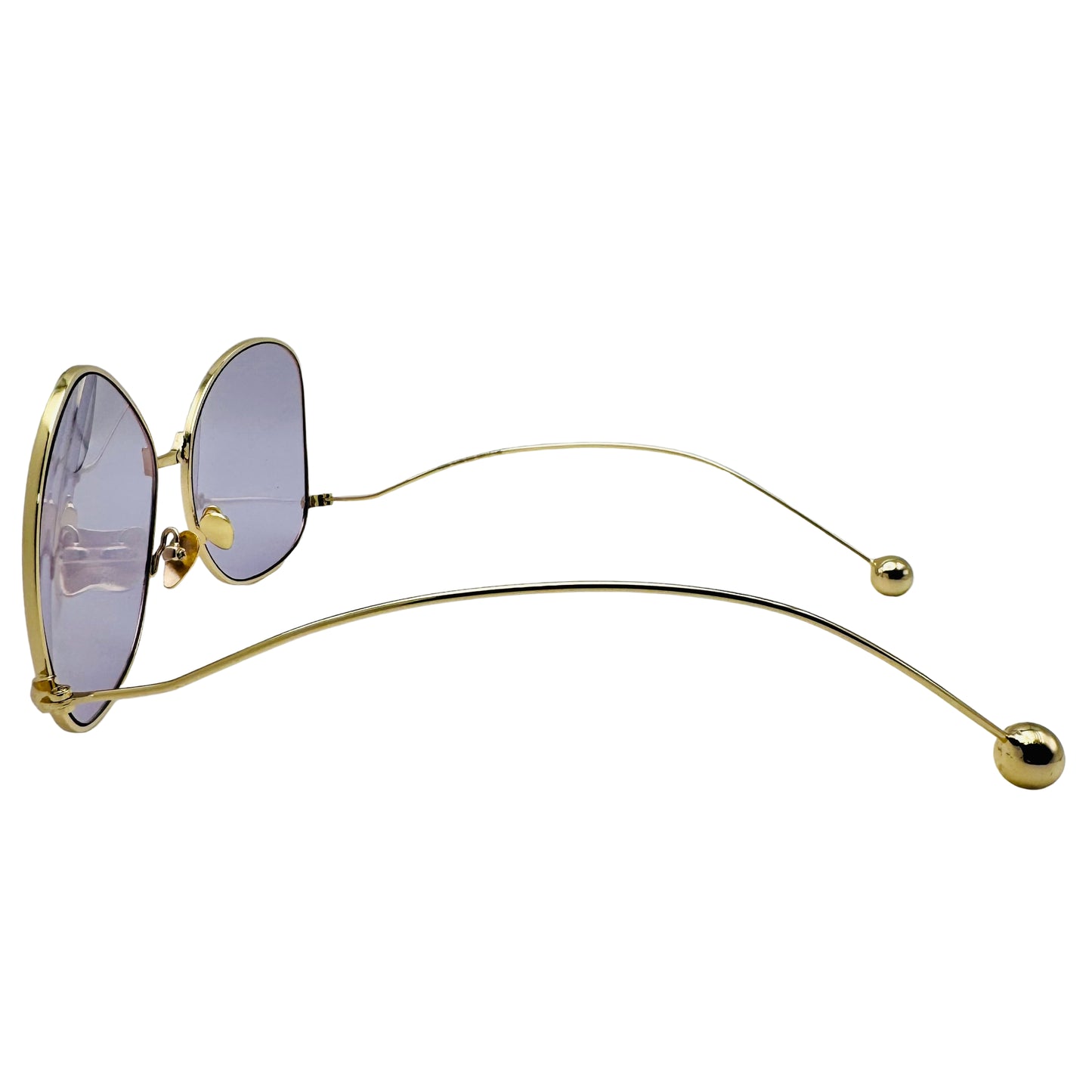 Gold-framed sunglasses with purple lenses on a white background