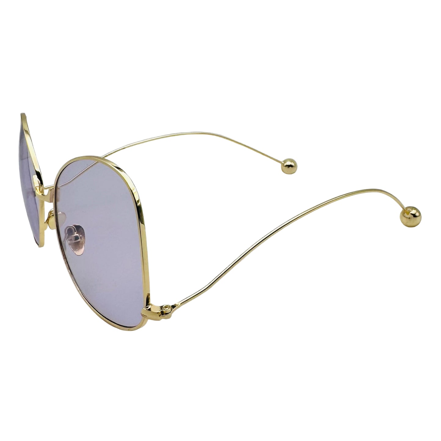 Gold-framed sunglasses with purple lenses on a white background