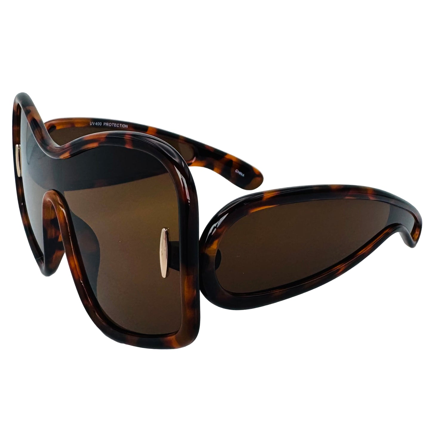 Sunglasses with tortoiseshell frame and brown lenses on a light gray background
