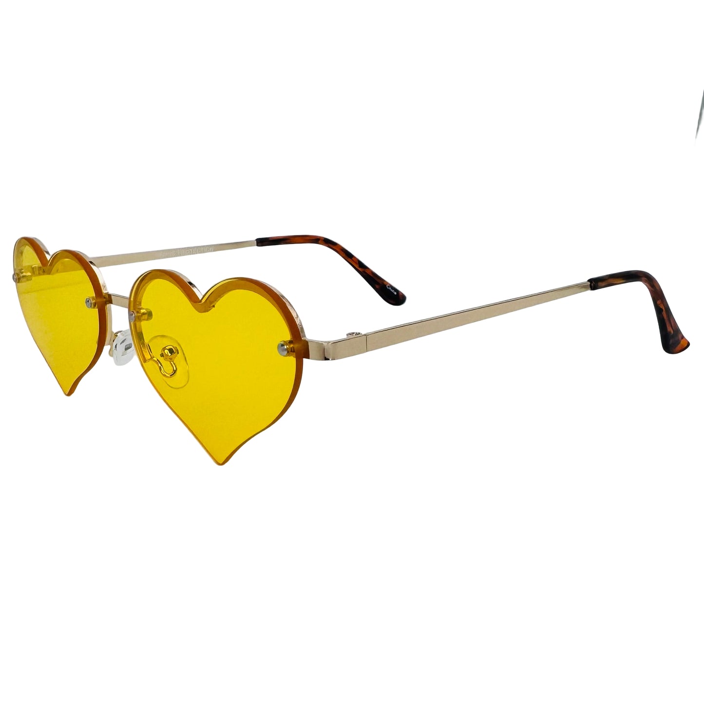 Heart-shaped yellow sunglasses with beige frames on a light gray background