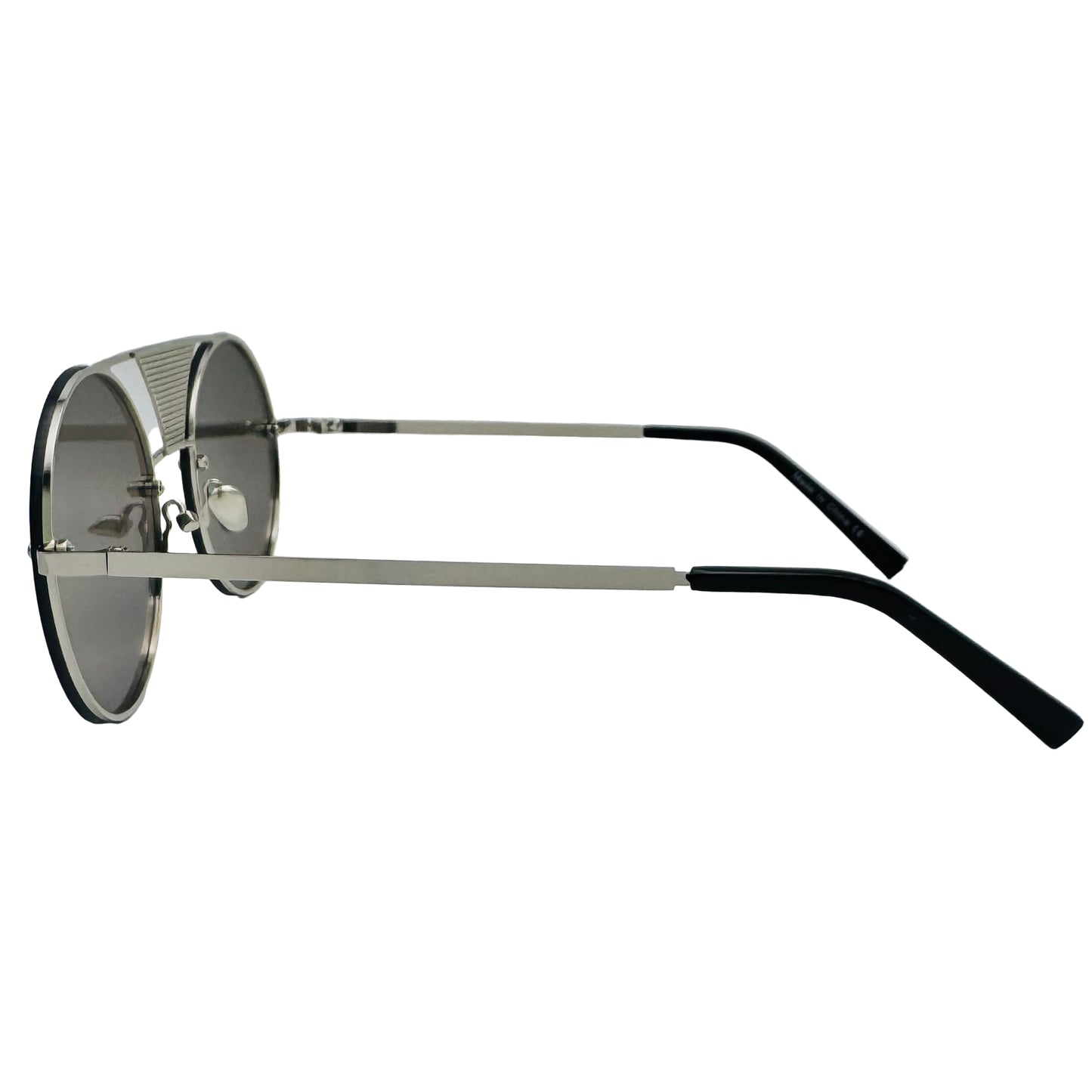 Sunglasses with metallic frame and black arms on a light gray background