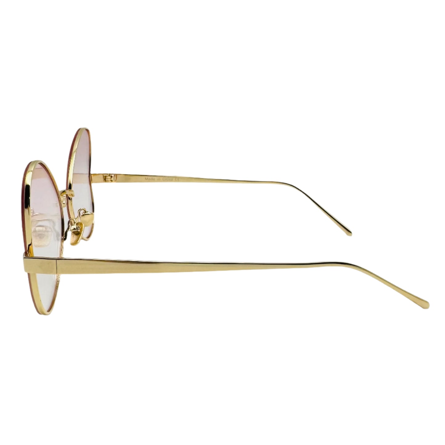 Gold-framed eyeglasses on a white background