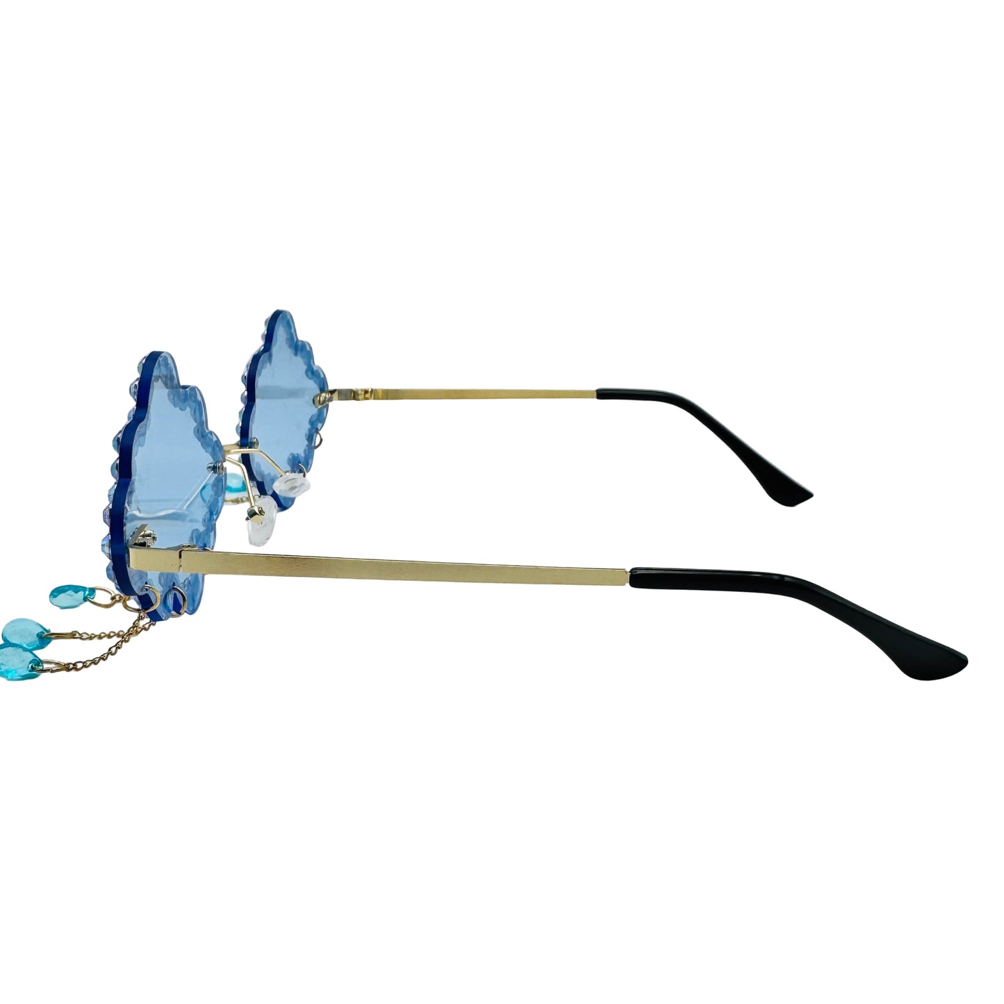 Sunglasses with blue gemstone-like lenses on a white background