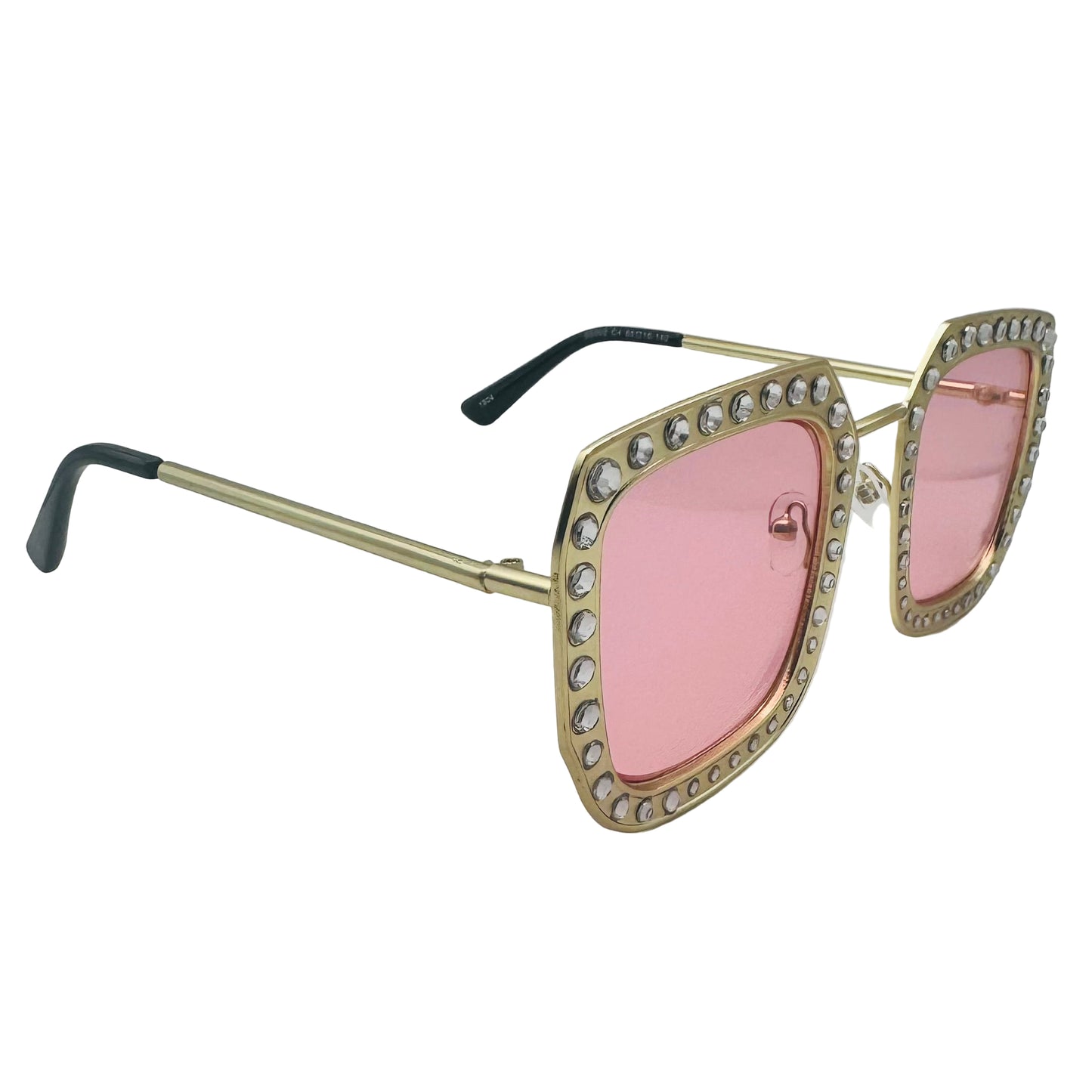 Sunglasses with pink lenses and gold frame on a light gray background