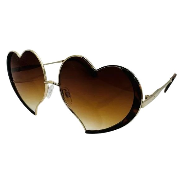 Heart-shaped sunglasses with gold frame and brown gradient lenses on a white background