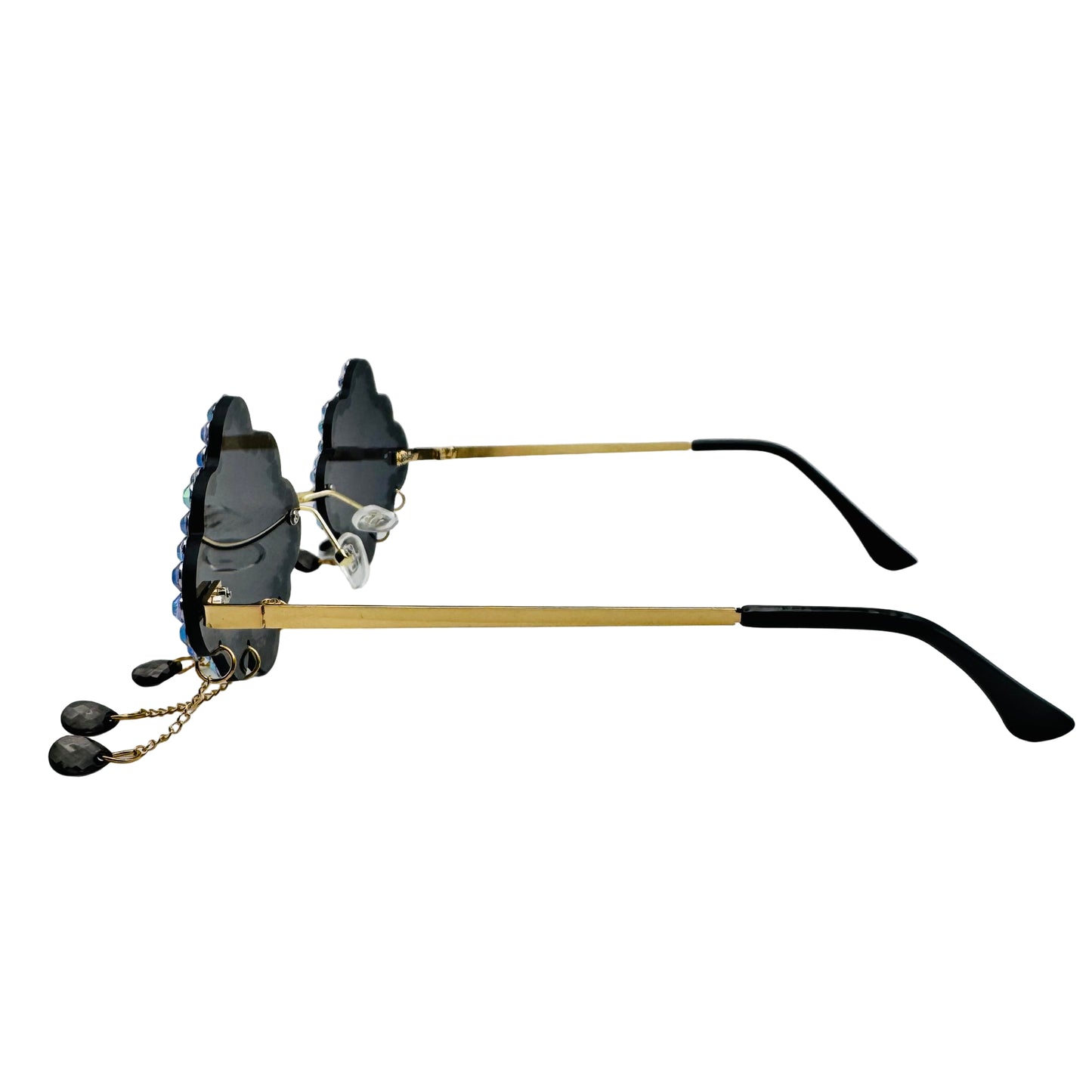 Sunglasses with gold frames and black accents on a white background