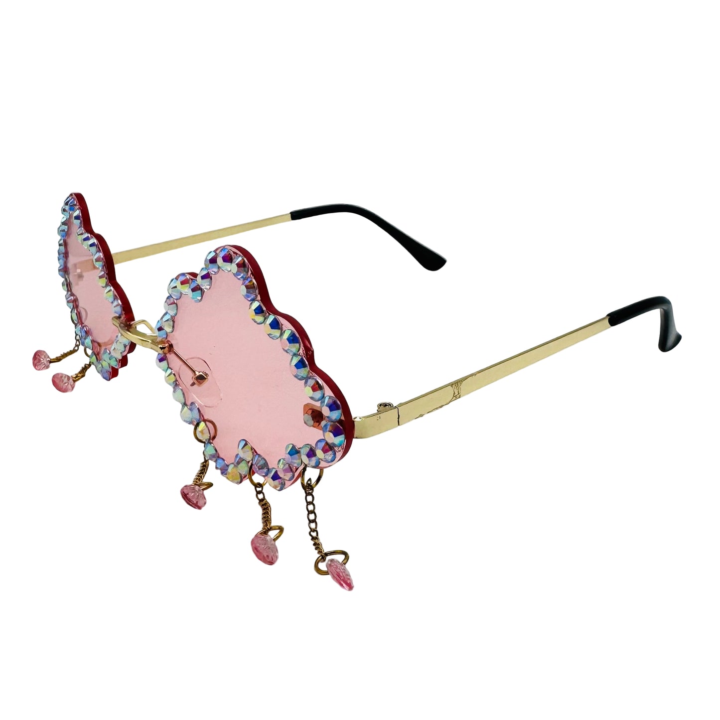 Decorative sunglasses with pink lenses and embellishments on a light gray background