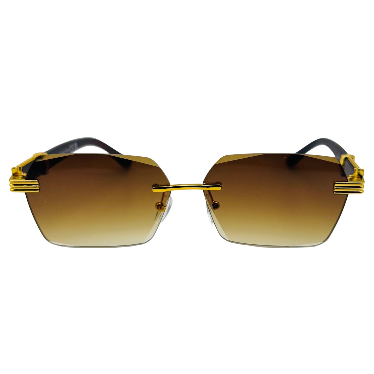 Gold-framed sunglasses with brown gradient lenses on a light gray background