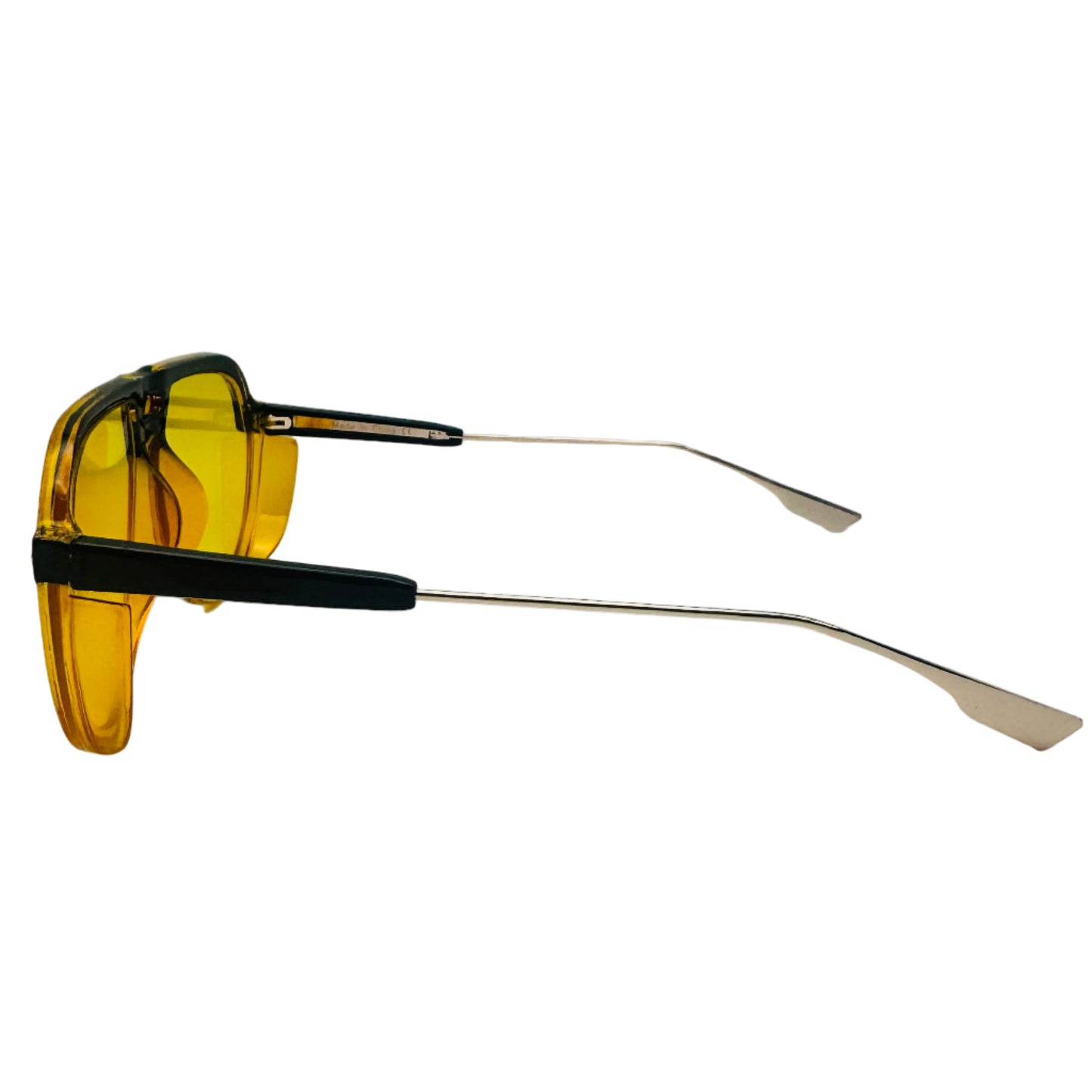 Sunglasses with yellow lenses and black frames on a light gray background