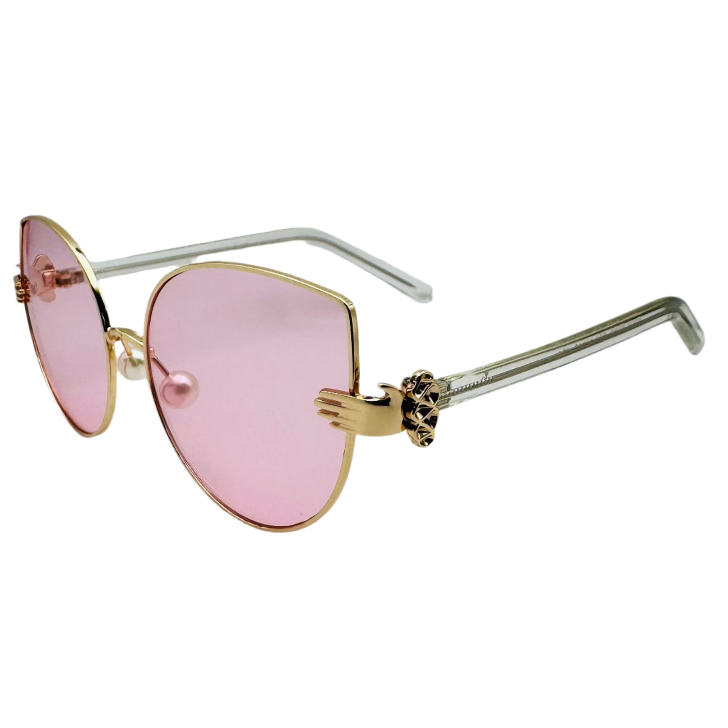 Sunglasses with pink lenses and gold frames on a white background