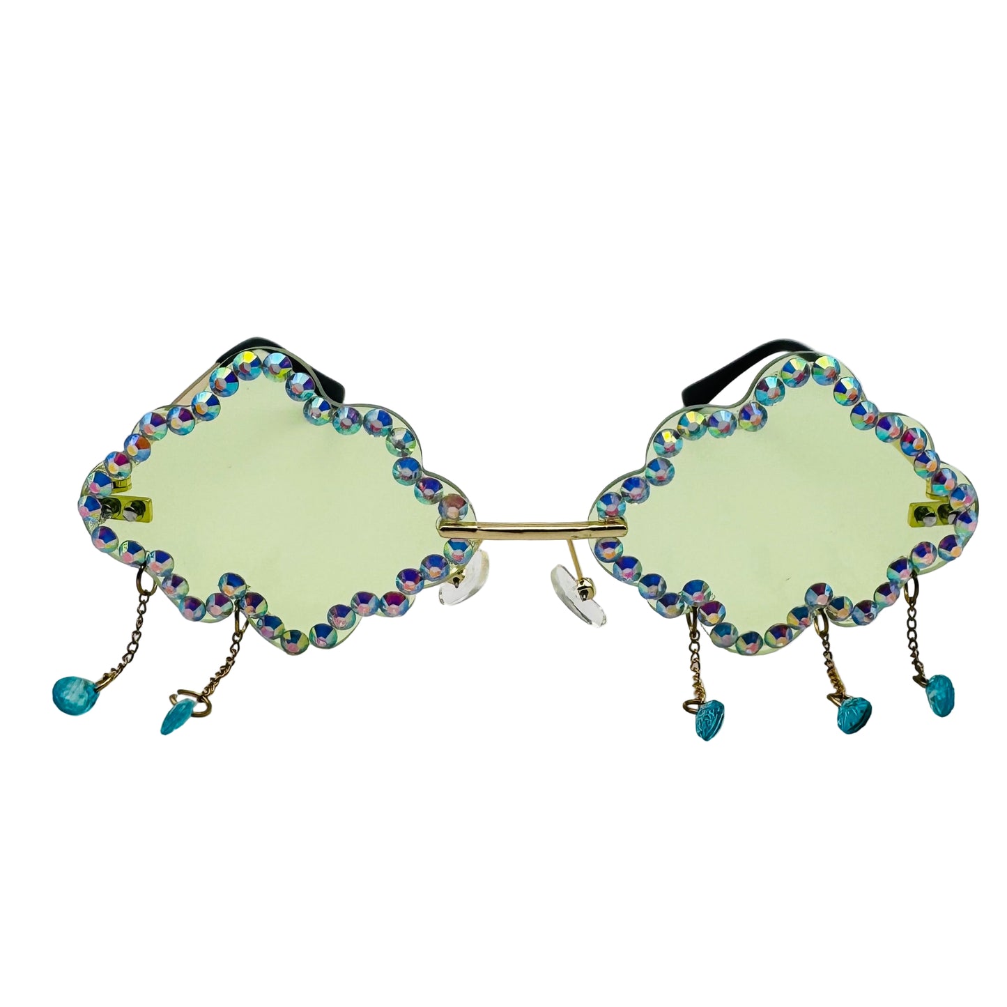 Decorative sunglasses with gemstones and chains on a white background