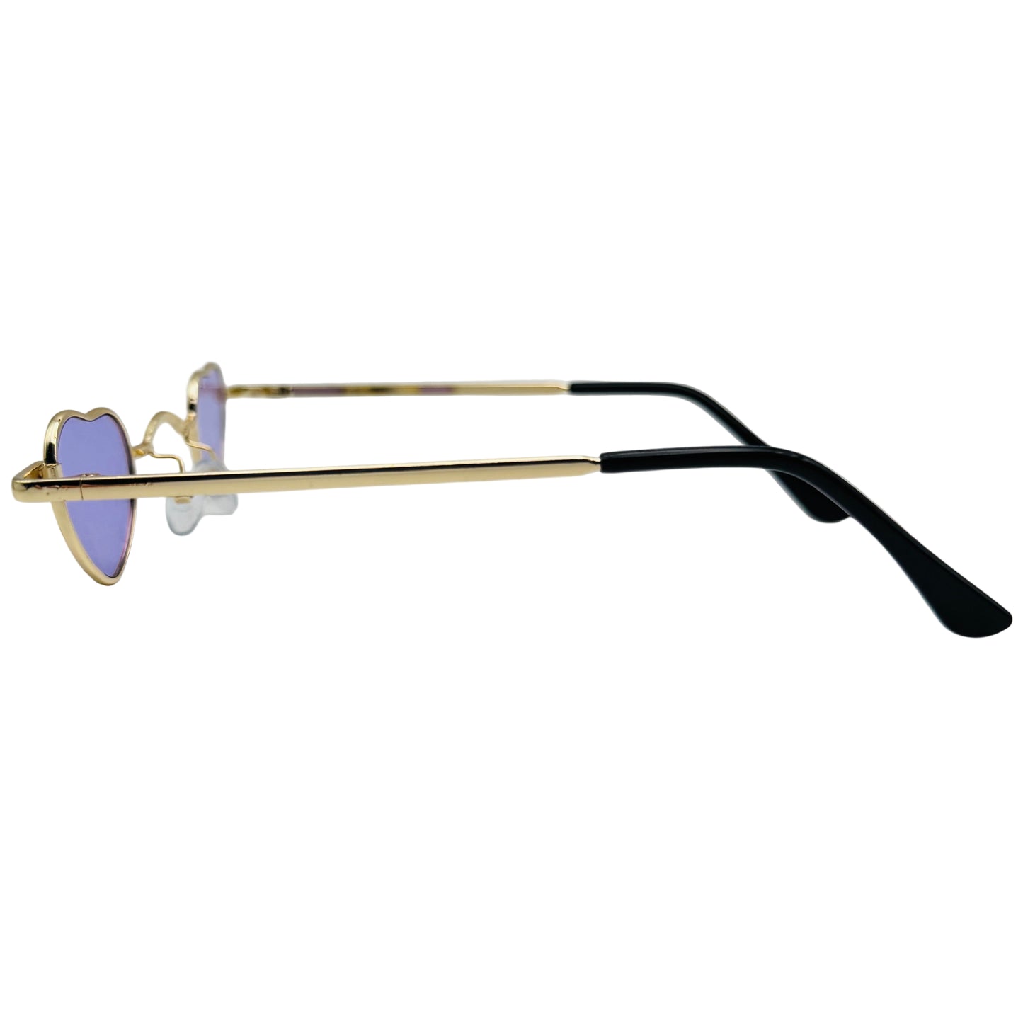 Sunglasses with gold frame and black arms on a light gray background