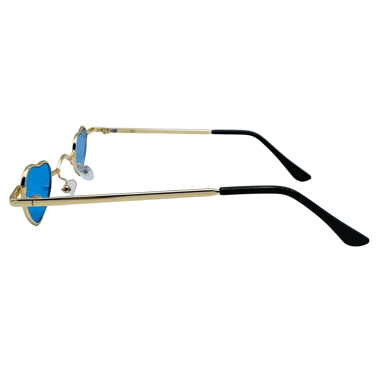 Sunglasses with gold frame and black arms on a light gray background