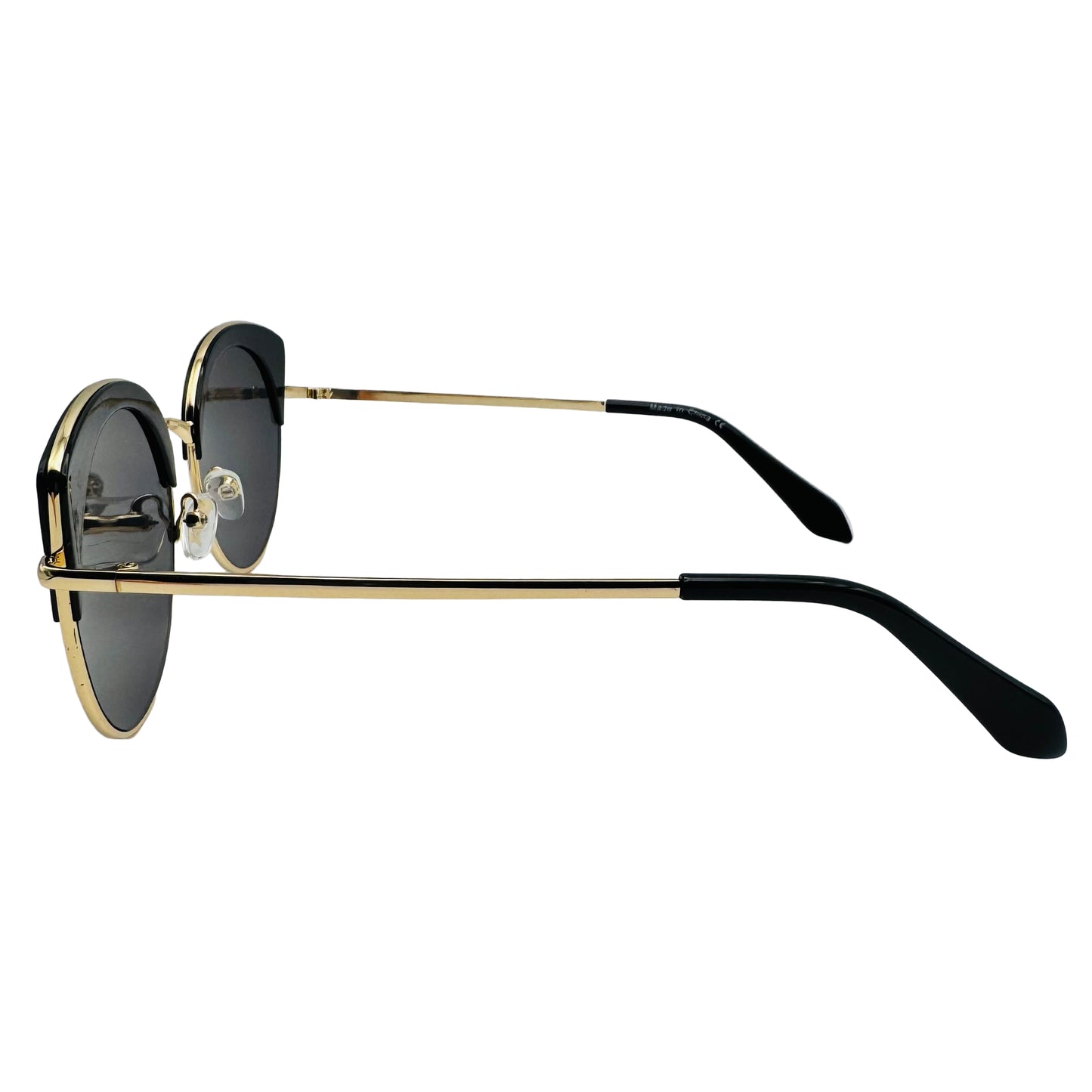 Sunglasses with gold frames and black lenses on a white background