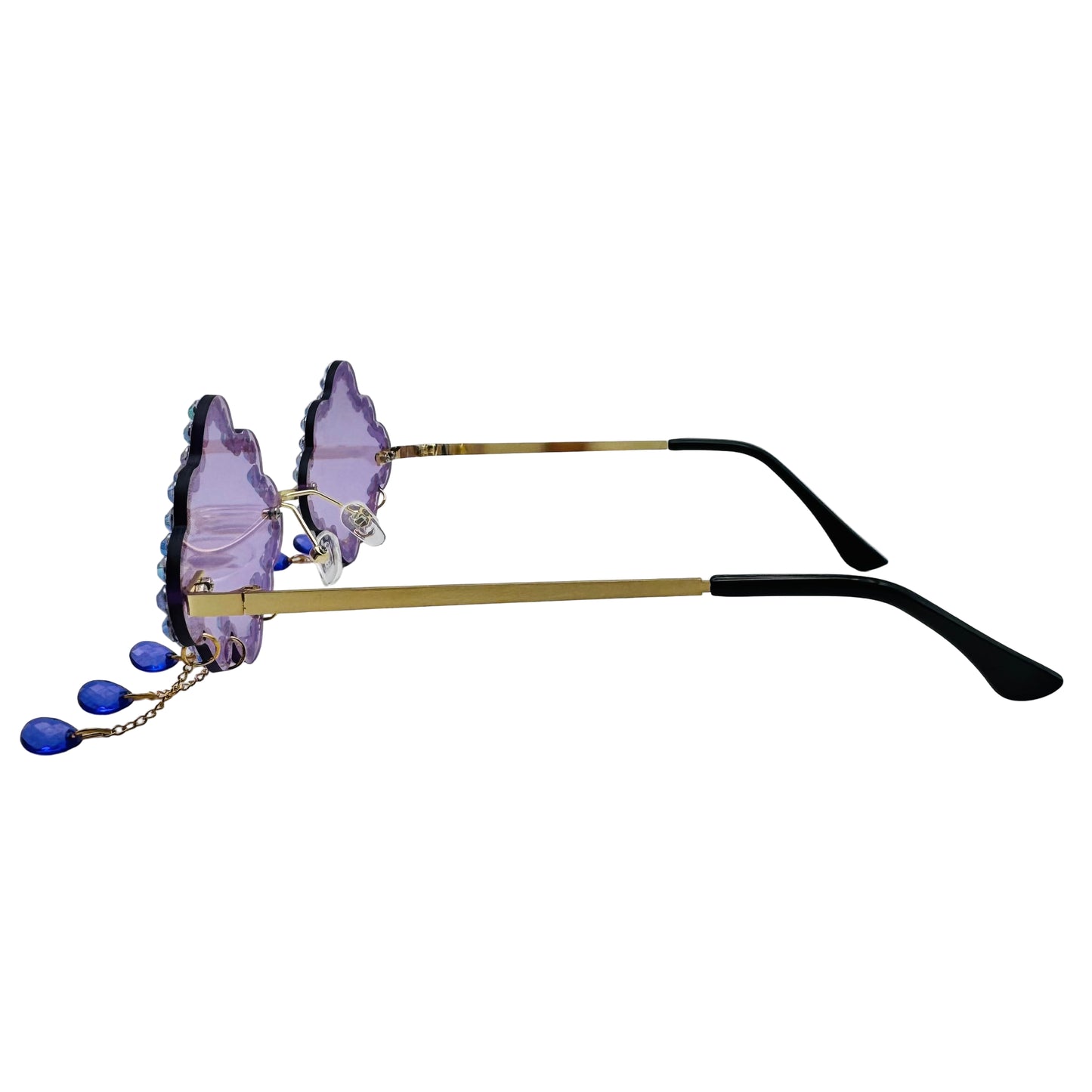 Sunglasses with purple lenses and gold frames on a white background