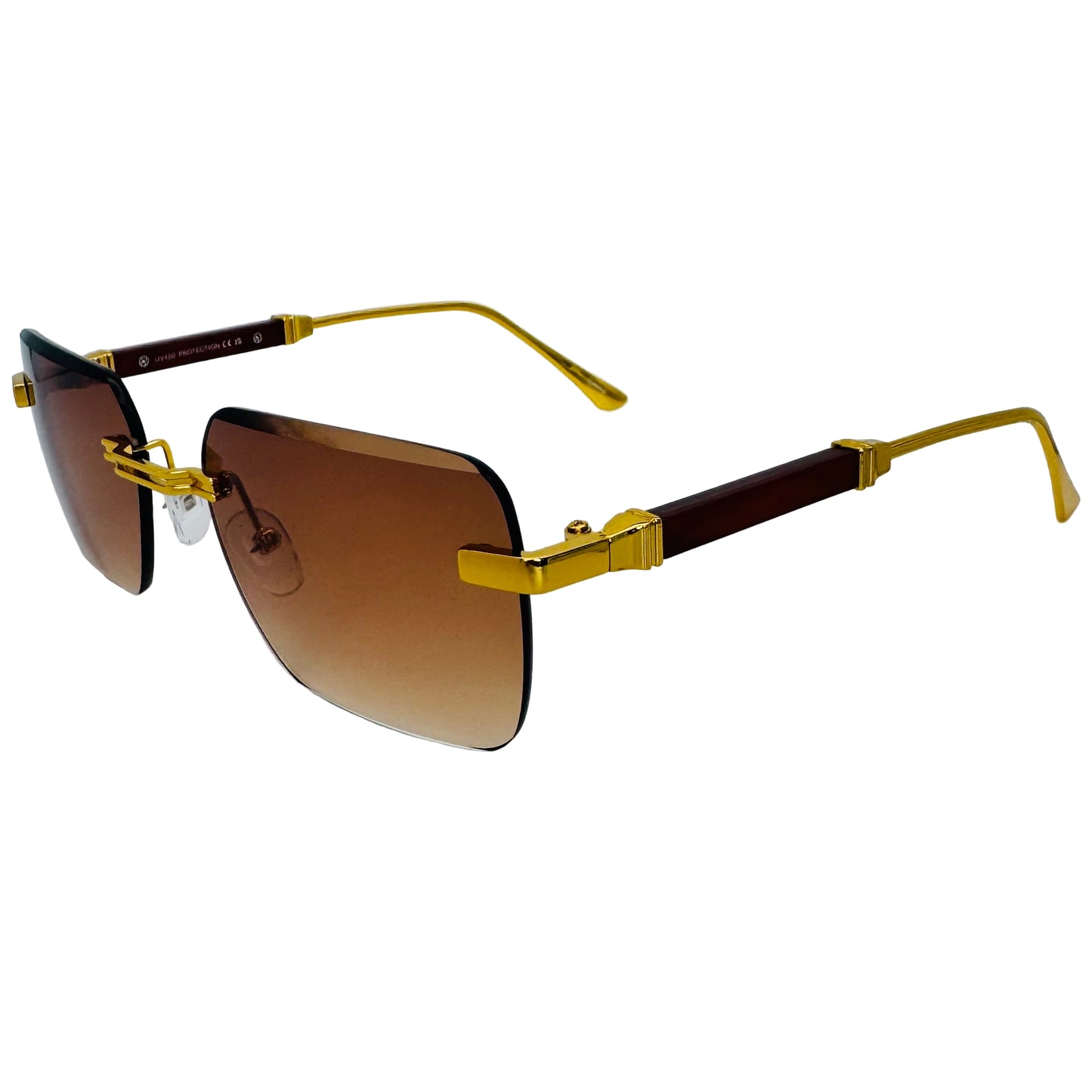 Sunglasses with gold frame and brown gradient lenses on a light gray background