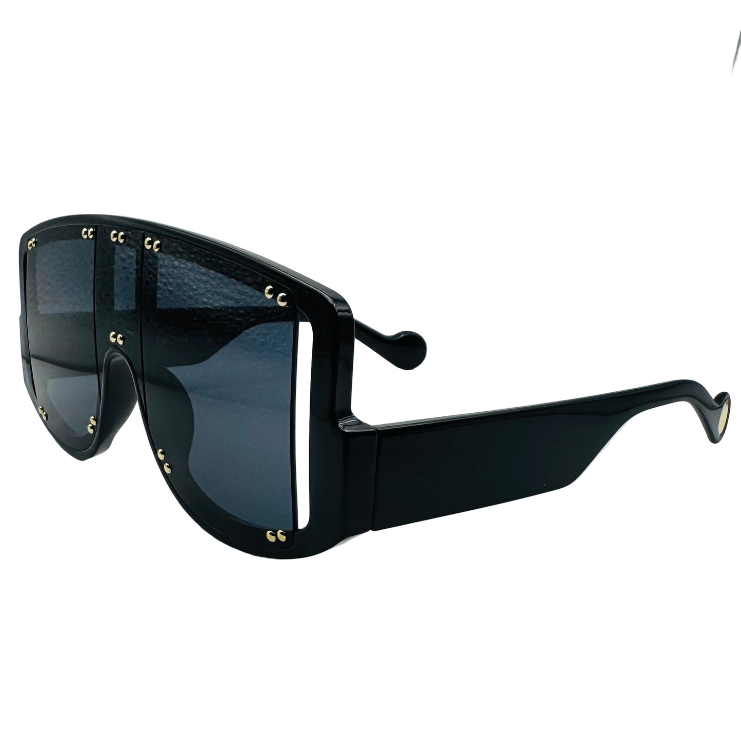 Black sunglasses with gold accents on a light gray background