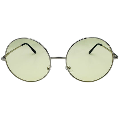 Round sunglasses with gold frame and green-tinted lenses on a light gray background