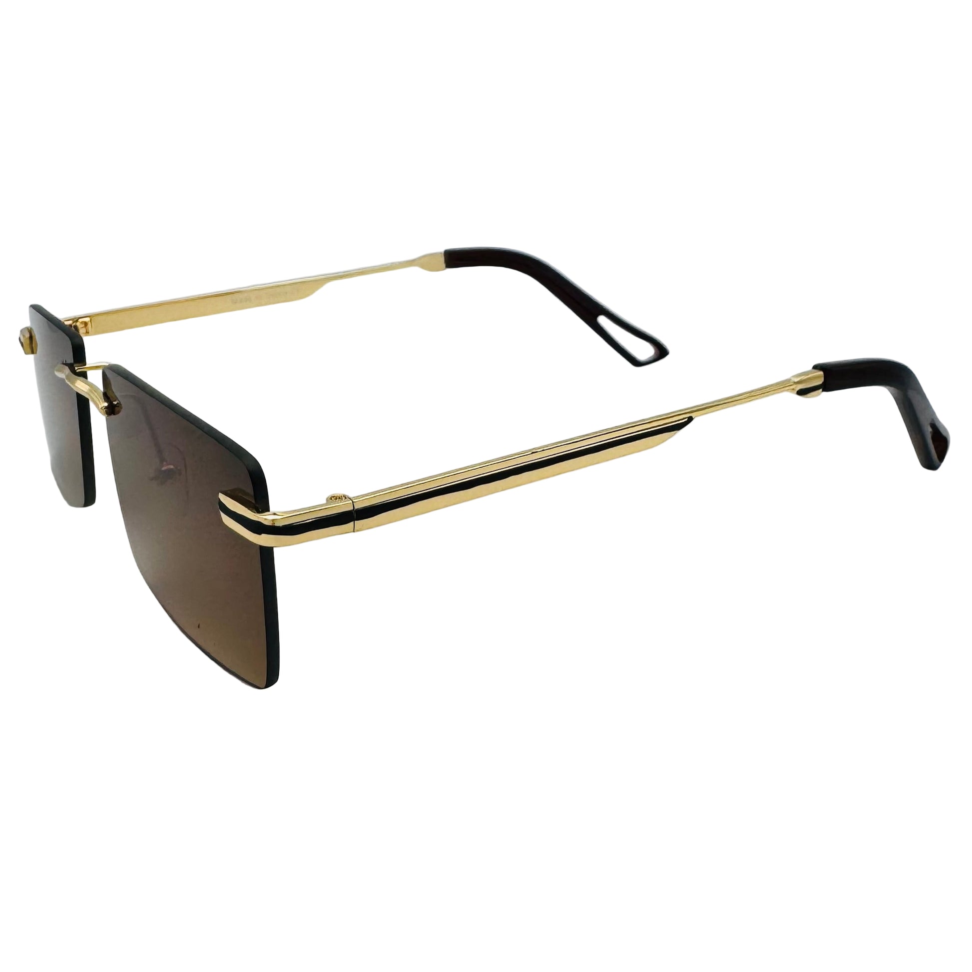 Sunglasses with gold frame and black lenses on a light gray background