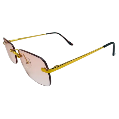 Sunglasses with gold frame and pink-tinted lenses on a white background