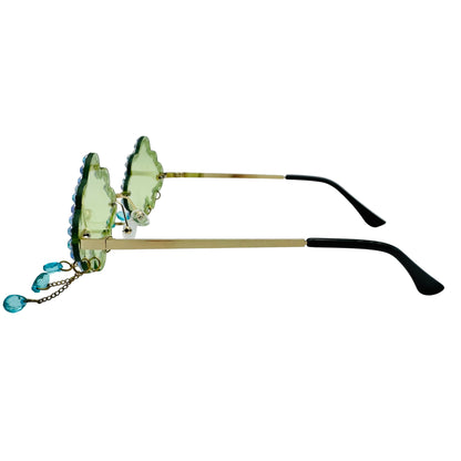 Sunglasses with green lenses and gold frames on a white background