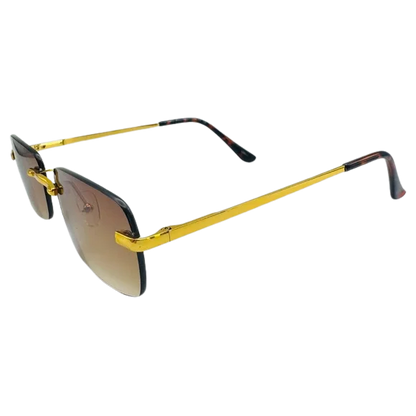 Sunglasses with gold frame and black sides on a white background