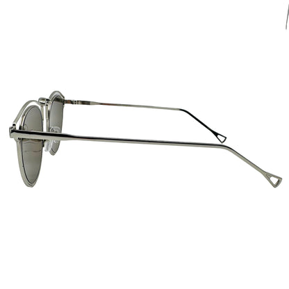 Silver sunglasses on a light gray background