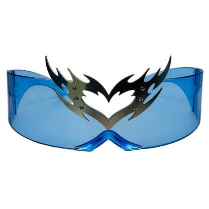 Blue goggles with a black tribal design on a light gray background