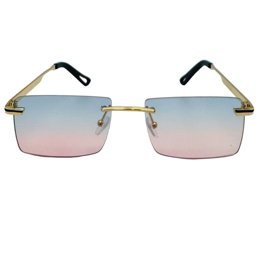 Sunglasses with gradient lenses and gold frames on a light gray background