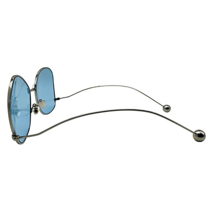Sunglasses with blue lenses and metallic frame on a white background
