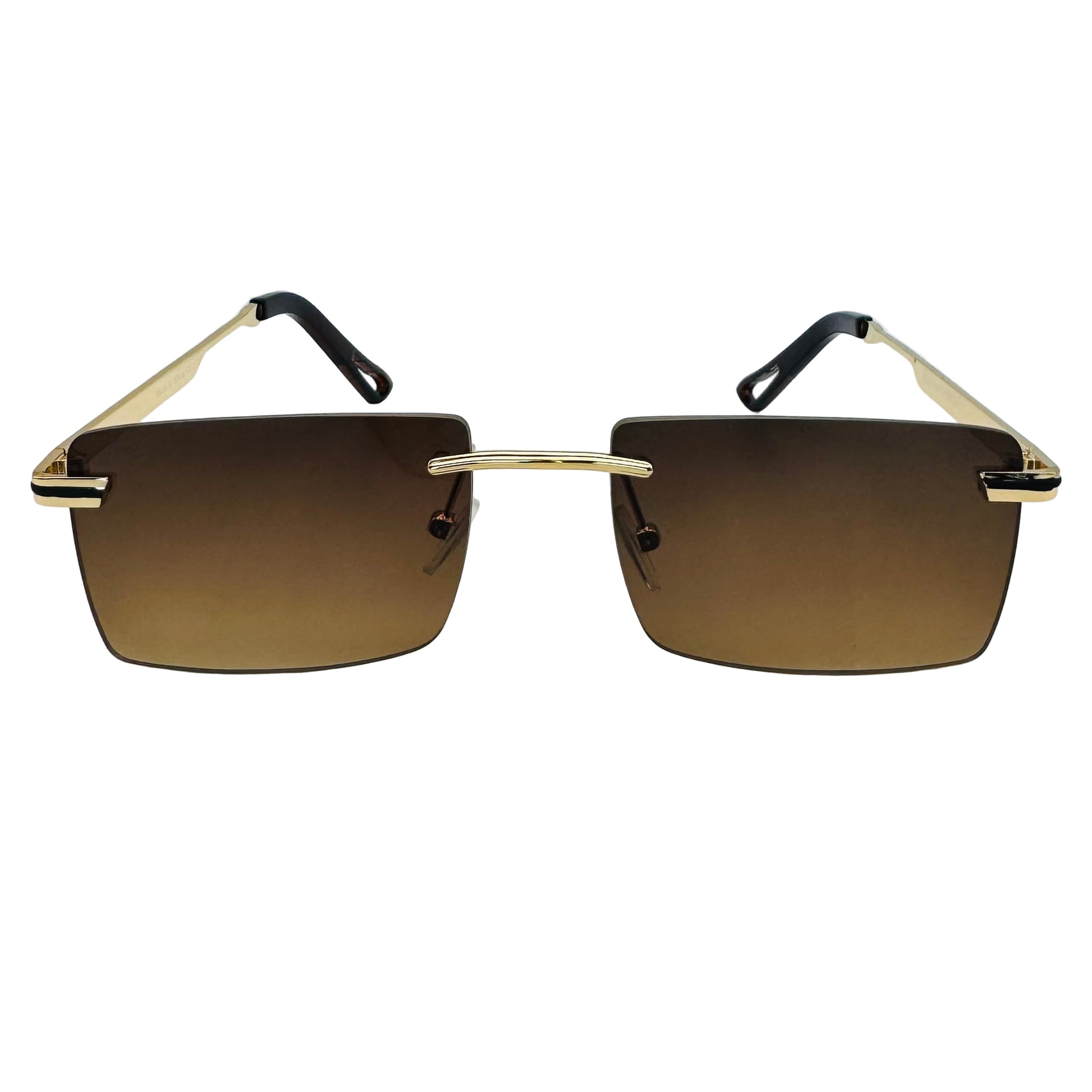 Sunglasses with gold frames and brown lenses on a light gray background