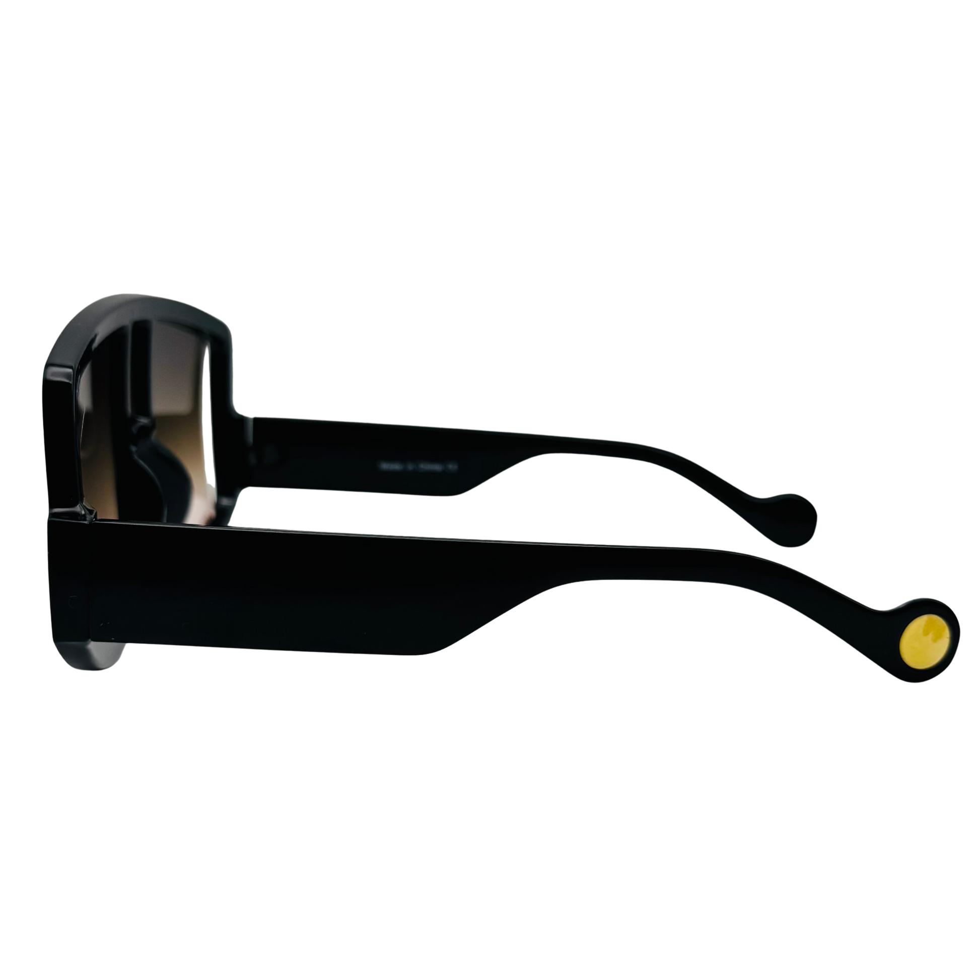 Black sunglasses with yellow accents on a white background