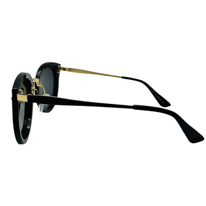 Black sunglasses with gold accents on a white background
