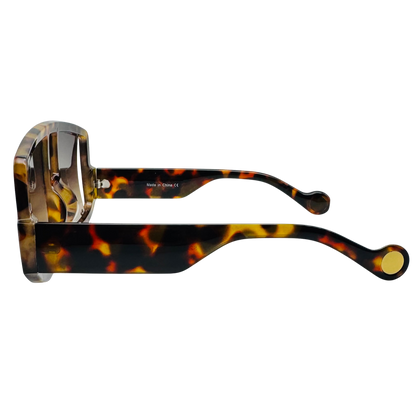 Tortoiseshell sunglasses with gold accents on a white background