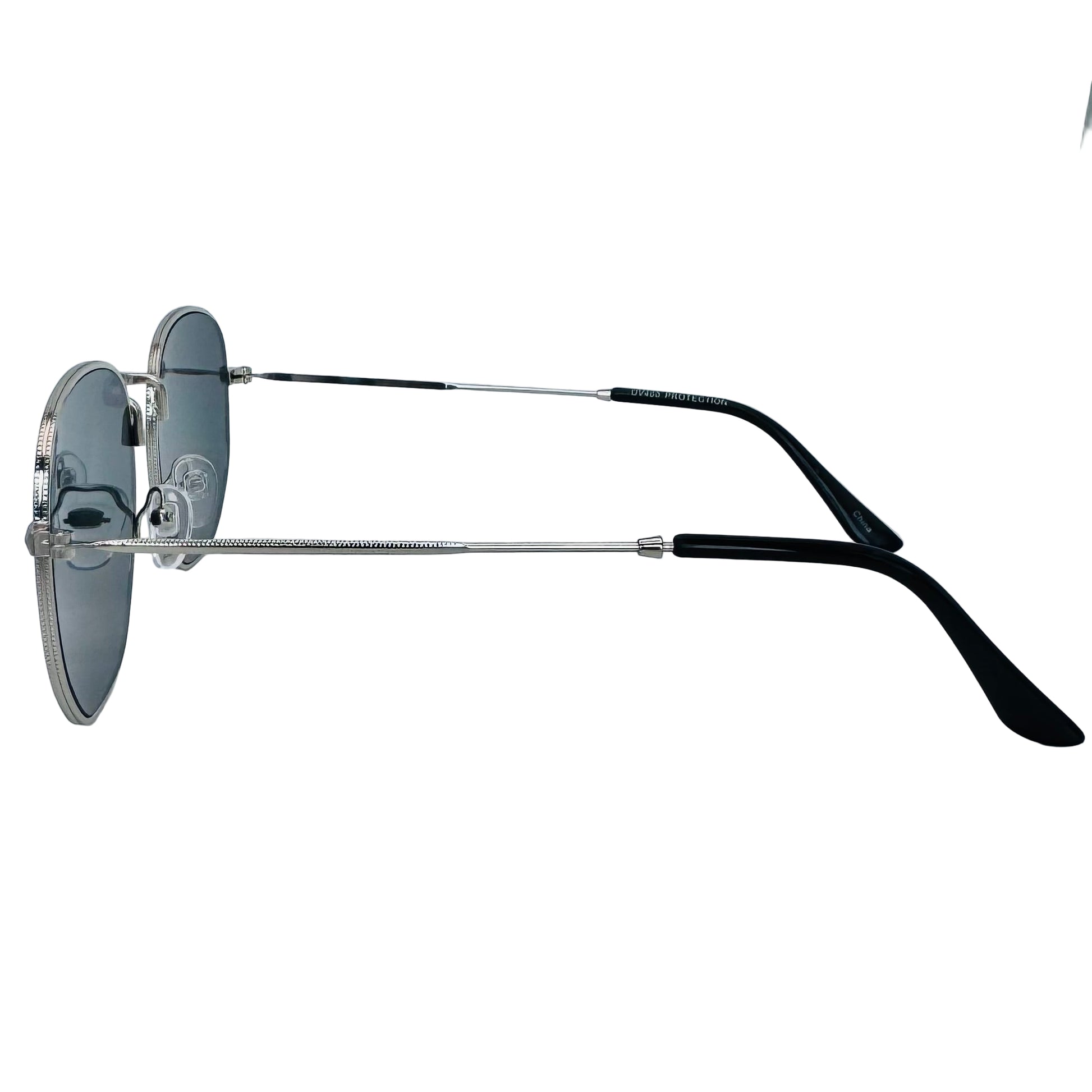 Sunglasses with black arms and silver frame on a light gray background