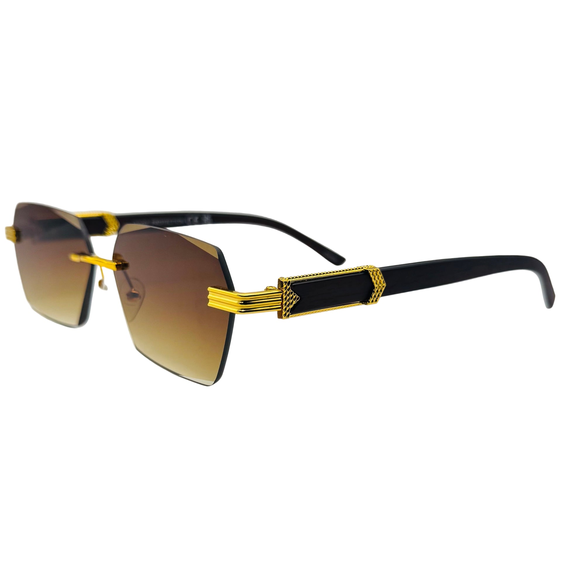 Sunglasses with gold frame and black accents on a light gray background