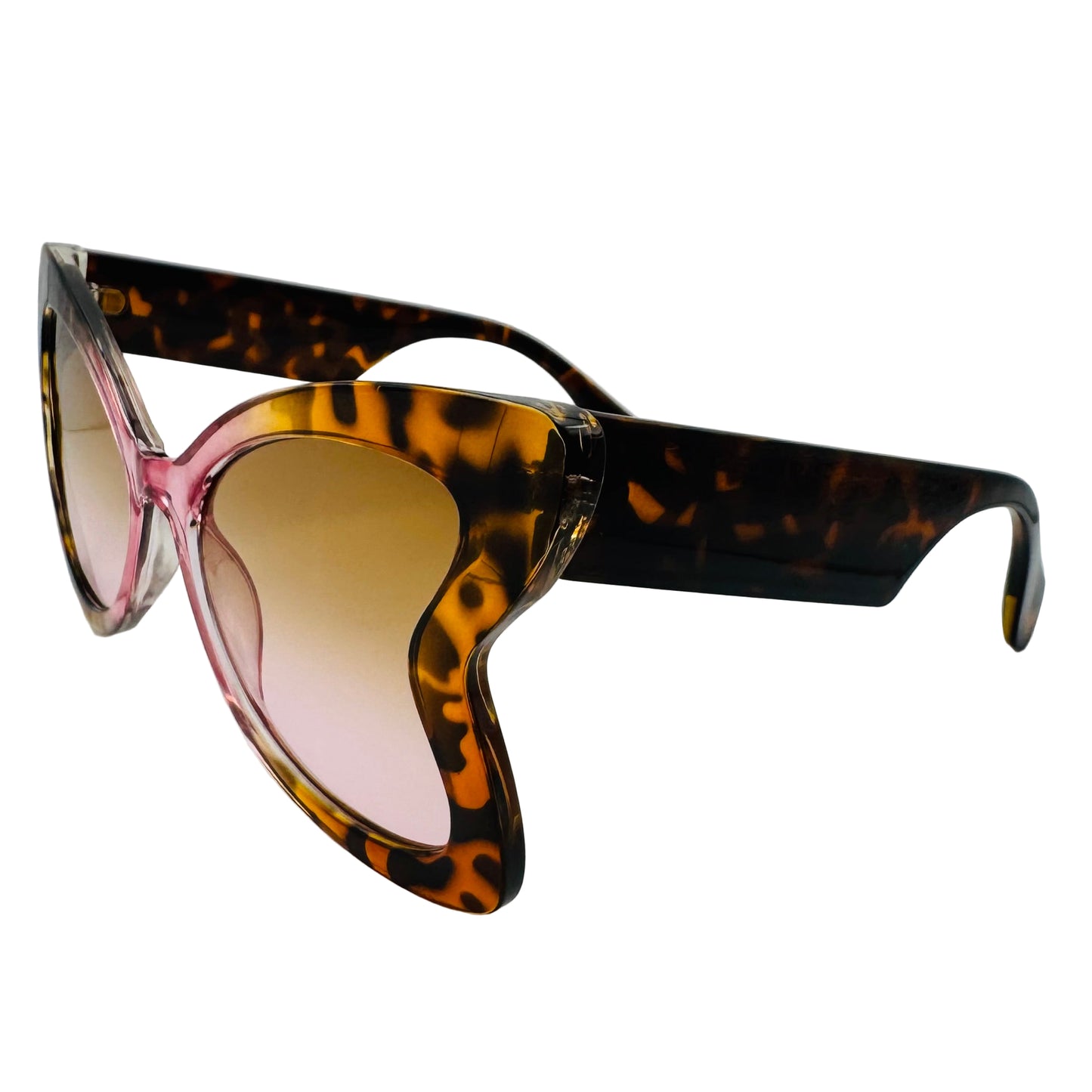 Sunglasses with tortoiseshell frame and pink lenses on a white background
