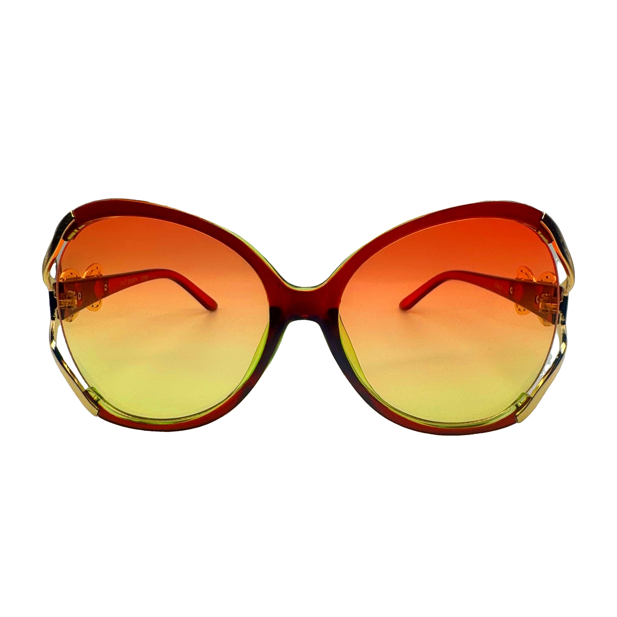 Oversized cat-eye sunglasses with a translucent red frame and gradient lenses that shift from orange at the top to yellow at the bottom, shown against a plain white background.