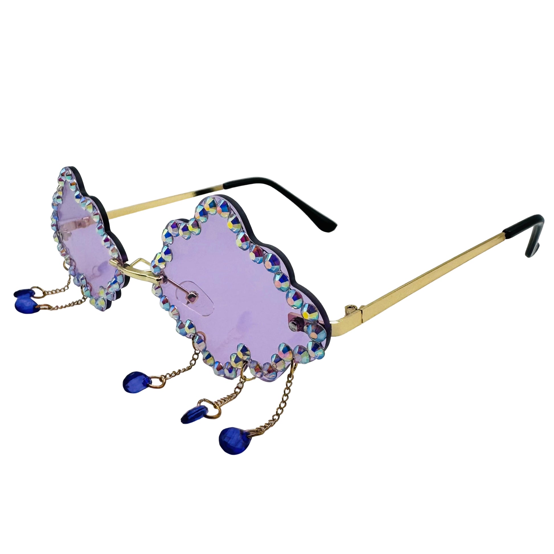 Sunglasses with purple lenses and gold frame on a white background