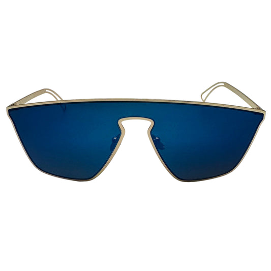 Sunglasses with blue lenses and gold frames on a light gray background