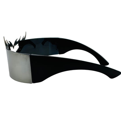 Black sunglasses with metallic frame on a light gray background
