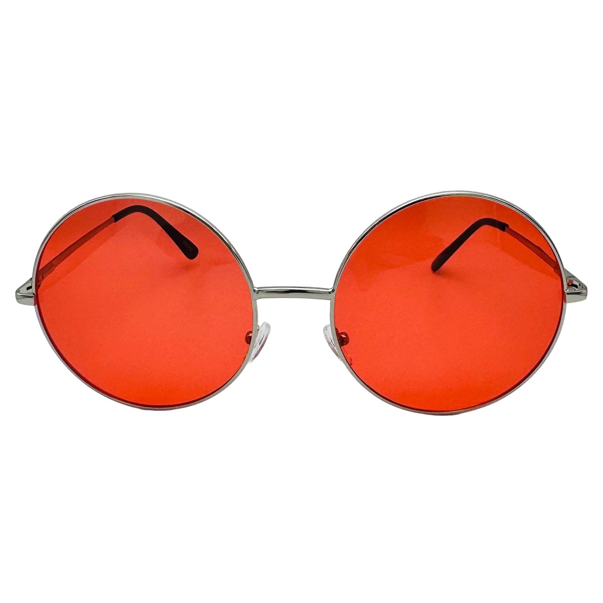 Round sunglasses with orange lenses and silver frames on a light gray background